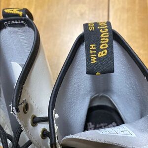 Dr. Martens White Boots with Black and Yellow Accents
